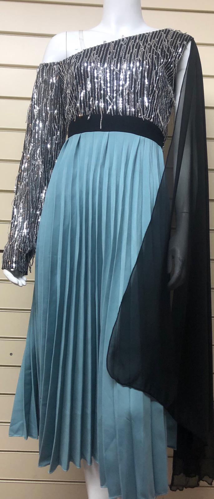 Brand new high end evening dress available in all UK sizes.