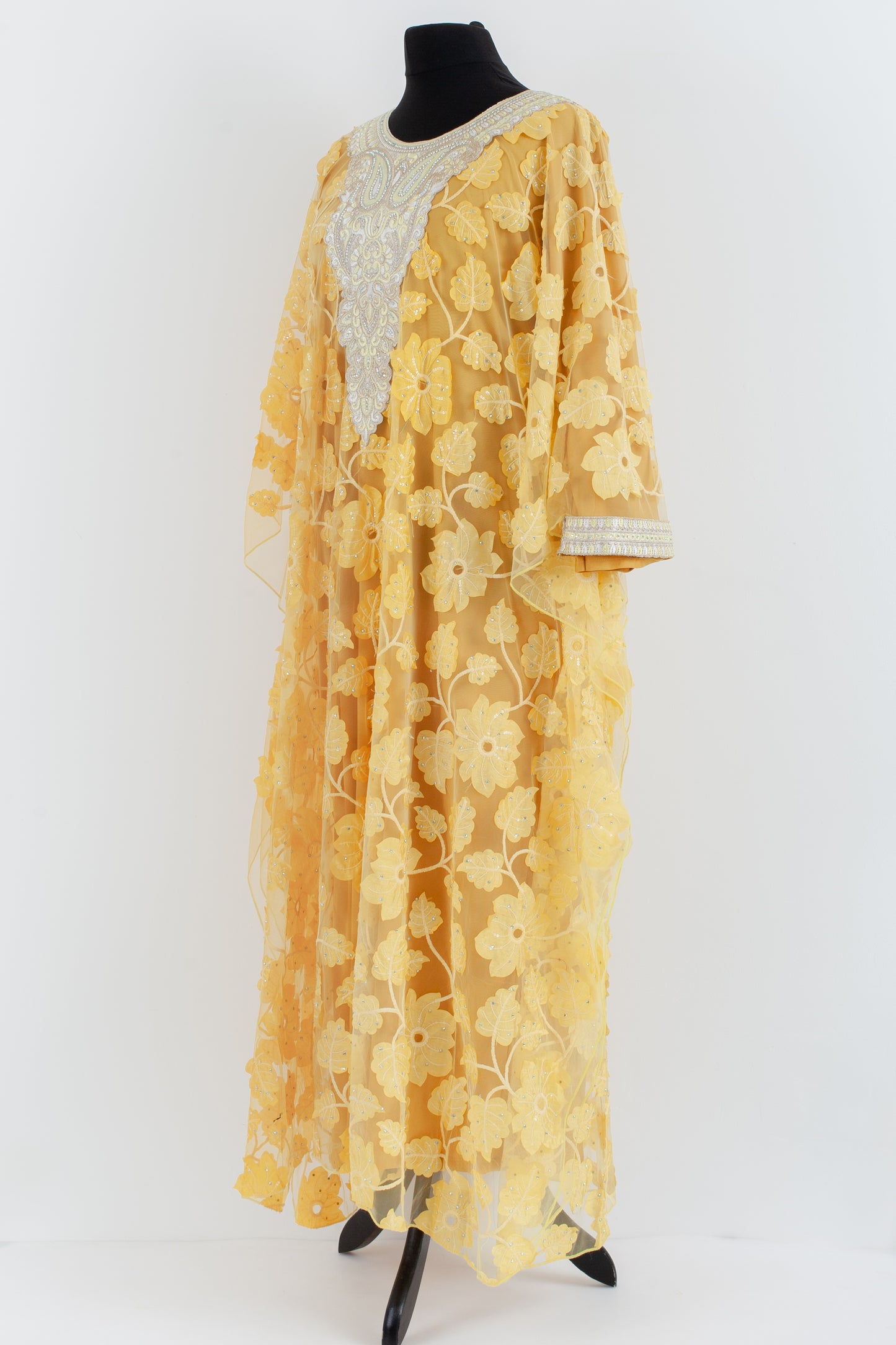 Embroidered yellow Jalabiyah.