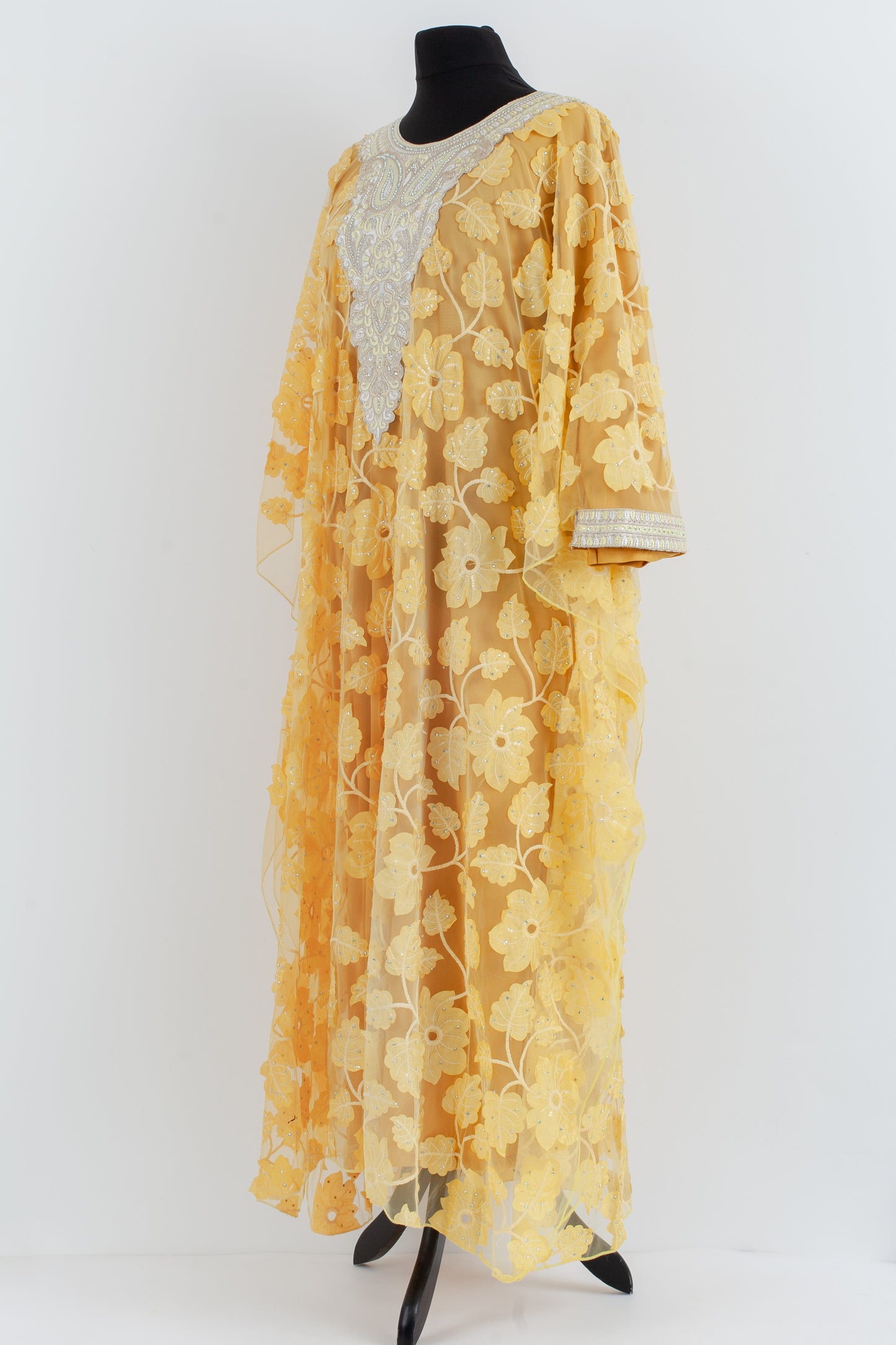 Embroidered yellow Jalabiyah.