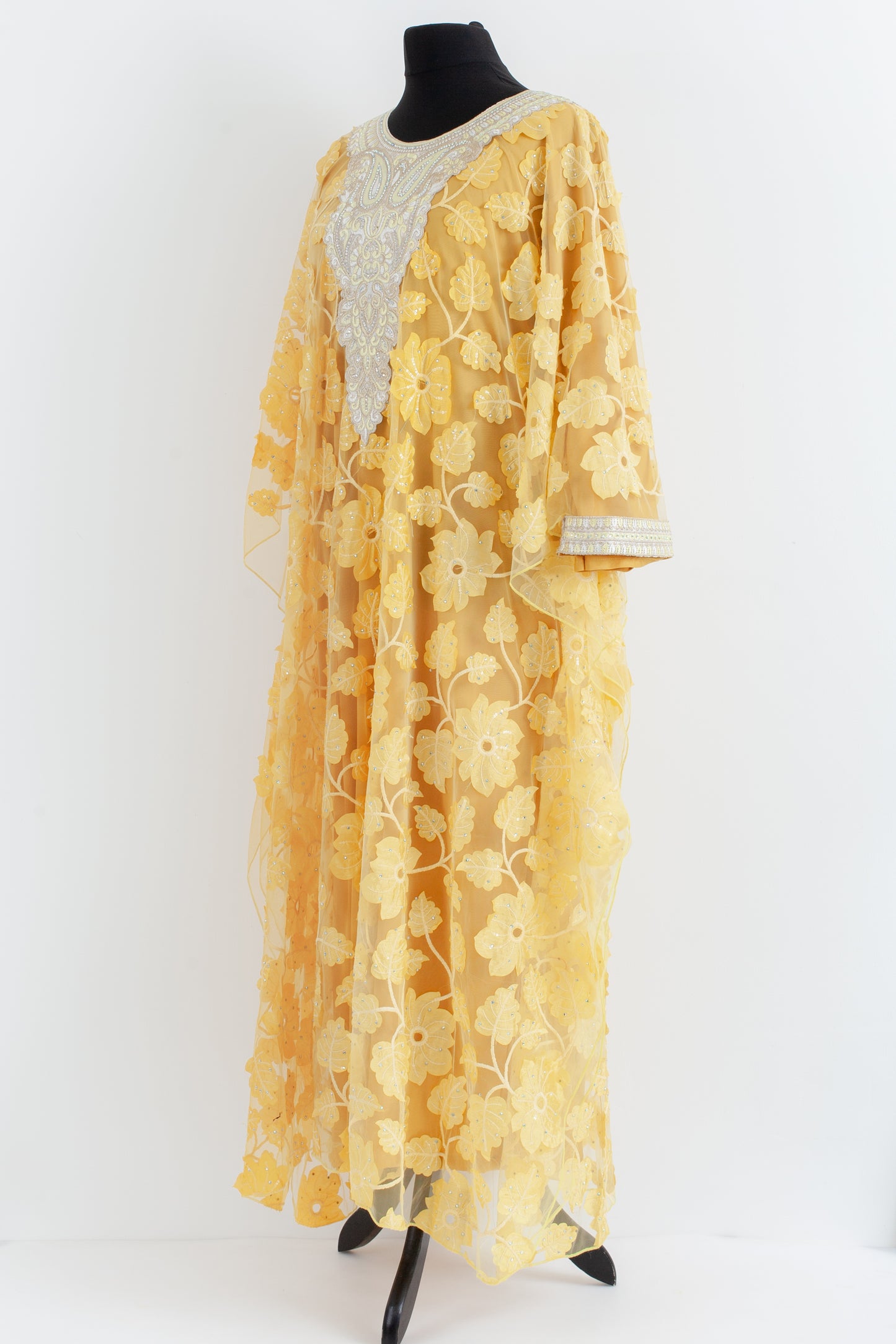 Embroidered yellow Jalabiyah.