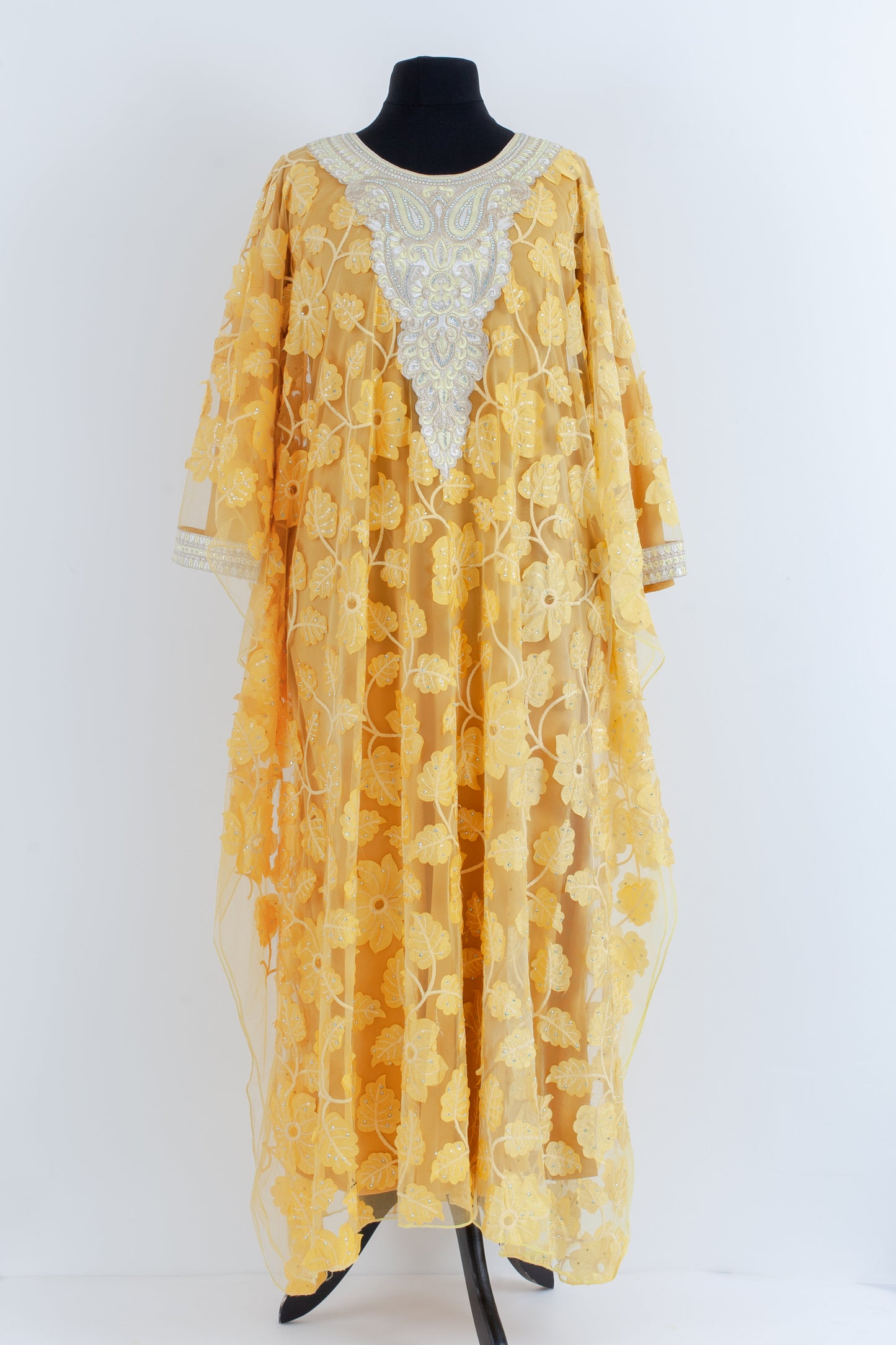 Embroidered yellow Jalabiyah.